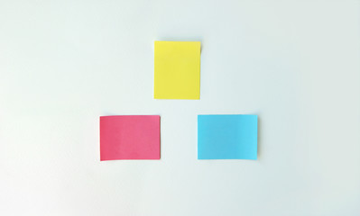 Empty space on multi-colored office stickers.