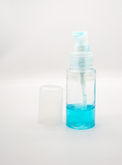 Coronavirus hand sanitizer gel to wash hands for flu virus prevention. Blue gel in clear plastic bag on white