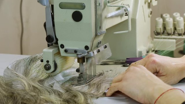 False hair. Hair for hair extension. Hair production for extension