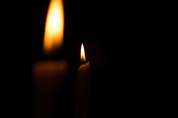 Fototapeta premium The background image is a light orange and yellow candle.