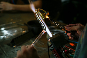 Process of handmade glassworks manufacturing with glass blowing burner