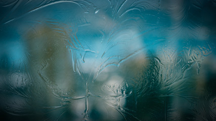 Frozen glass - natural winter background.