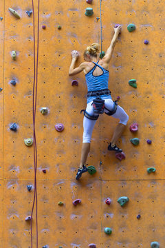  Girl Climbing Up The Wall