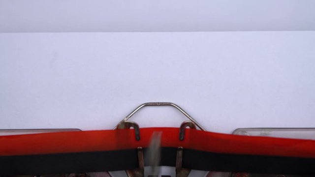 Chapter 2 - phrase printed on an old typewriter in red letters, close up. vintage inscription
