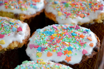 cookies with icing and sprinkles Easter cake decorated with colorful sprinkles closeup