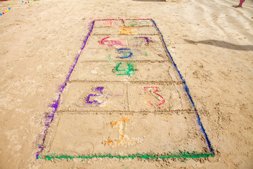 Hopscotch in colour hand made at a beach