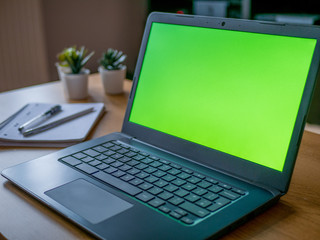 Green Screen Chroma Laptop Background on Home Desktop Working Remotely