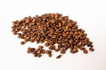 Fototapeta na wymiar Coffee beans on a white background / Background