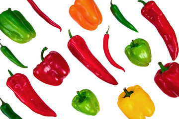 Top view of types of peppers isolated on white. Bio food, fresh vegetables