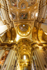 Obraz premium ROME, ITALY - May 2, 2015: The nave of baroque church Basilica di Sant Andrea della Valle. Famous basilica, Piazza Vidoni, built in Baroque style, 1608 AD. Church interior with reflection.