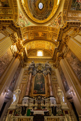 Obraz premium ROME, ITALY - May 2, 2015: The nave of baroque church Basilica di Sant Andrea della Valle. Famous basilica, Piazza Vidoni, built in Baroque style, 1608 AD. Church interior with reflection.