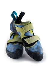 Isolated climbing shoes in a white background. Blue and yellow. used.