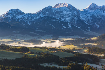 Morning fog in the valley in the Austrian Alps