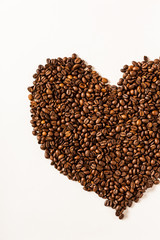 Obraz na płótnie Canvas Coffee beans on a white background / Background
