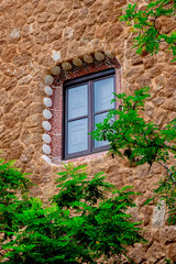 Fototapeta na wymiar Fragment of a window in a house