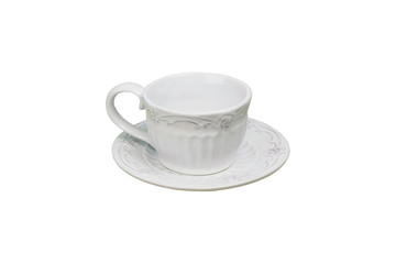 White cup on a saucer isolated on a white background. Top view. Close-up.