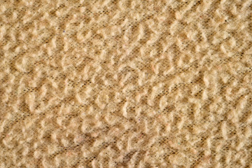 Texture of dark beige fabric close-up, fabric texture.