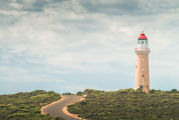Fototapeta na wymiar Cape Du Couedic Lighthouse by winding road, Kangaroo Island