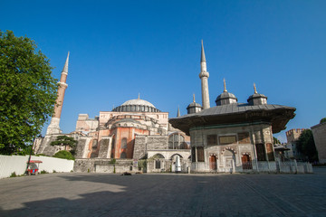 Fototapeta na wymiar Istanbul, Turkey. Hagia Sophia Museum and Fountain of Sultan Ahmed III near Topkapi Palace entrance