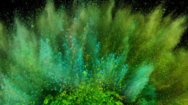 Super slow motion of coloured powder rotation isolated on black background. Filmed on high speed cinema camera, 1000fps.