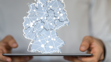 a virtual germany land  map digital in hand 3d