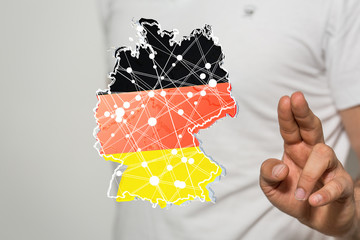 a virtual germany land  map digital in hand 3d