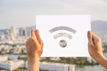 Postcard with a Wi-Fi wireless network icon, Internet in the city