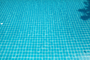 Tiles of a blue pool