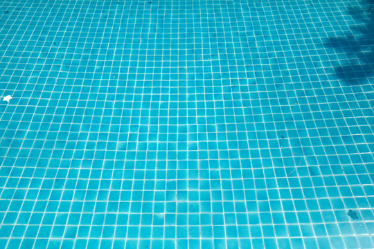 Tiles of a blue pool