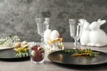 Festive Easter table setting with beautiful floral decor