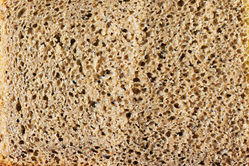 The porous texture of bread from a mixture of rye and wheat flour.
