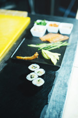 Photo of Chef preparing rolls in kitchen, fresh and tasty japan food