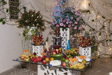 Decoration of social events; Individual dessert table for the guests at the wedding reception.