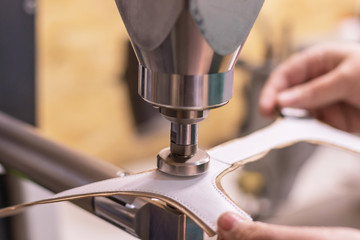 Shoe production process in factory, leather shoemaking
