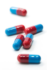 prescription pills on white background closeup