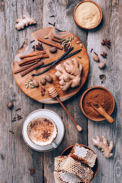 Tea With Milk, Cloves, Ginger, Cardamom, Cinnamon, Anise, Vanile, Honey, Nutmeg. Indian Masala Tea With Spices. Top View, Copy Space. Antiviral Beverage. Healthy Ayurvedic Spice Drink Chai