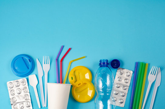 White Single Use Plastic And Plastic Drink Straws On A Blue Background Say No To Single Use