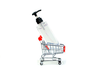 Alcohol gel in red shopping cart isolate on white background.