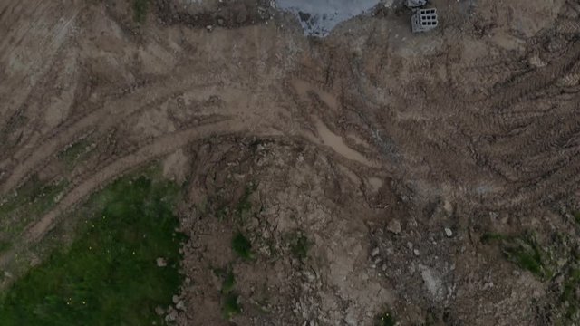 drone view of new house parcel. In real estate, a lot or plot is a tract or parcel of land owned or meant to be owned by some owner(s). A lot is essentially considered a parcel of real property