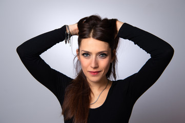 Fototapeta premium A lady with everyday jewellery for a chic look and fashionable eye makeup