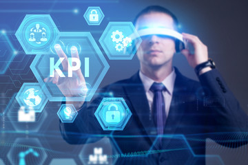 Business, Technology, Internet and network concept. Young businessman working on a virtual screen of the future and sees the inscription: