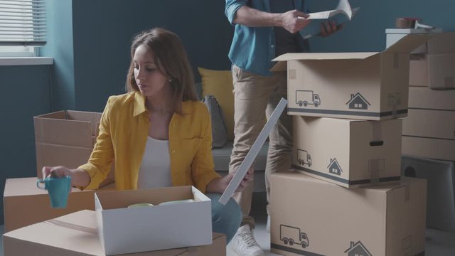 Happy young couple moving in their new home video montage