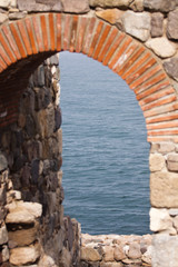 Fototapeta na wymiar Detail of a fortified stone wall