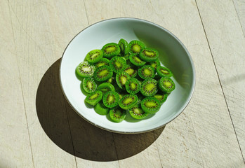 Bowl of sliced baby kiwi