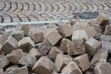 Closeup of geometric cobblestone construction site in the street