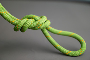 isolated climbing rope tied in figure eight