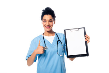 Front view of african american nurse with stethoscope showing clipboard and thumb up isolated on...