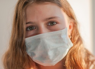 A girl in medical mask