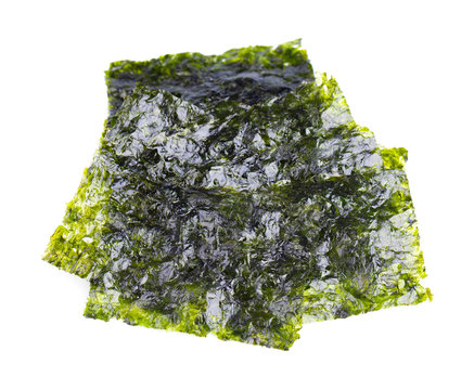 Crispy nori seaweed isolated on white background. Japanese food nori. Dry seaweed sheets.