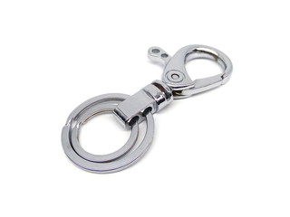 Close up of key chain or key ring isolated on white background. Alloy keychain. Chrome color keyring.
